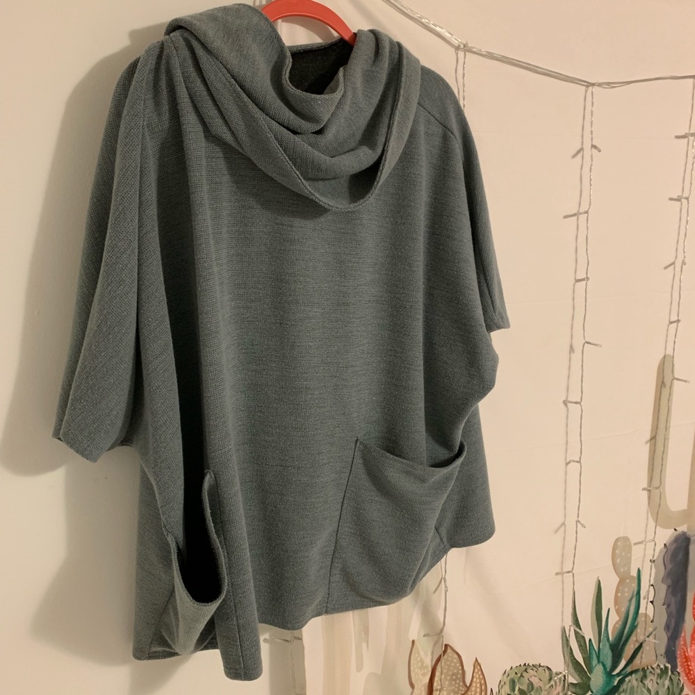 Sweater poncho.